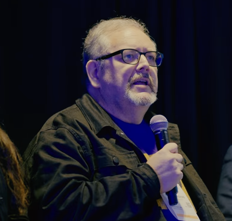 Eric Burgess speaking